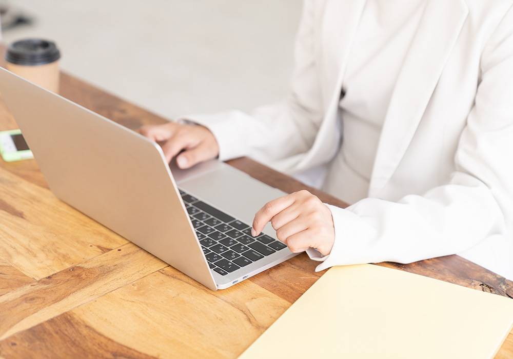 woman on open laptop