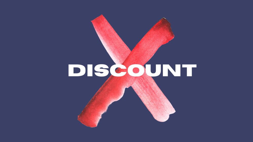 Discount with painted red cross over it